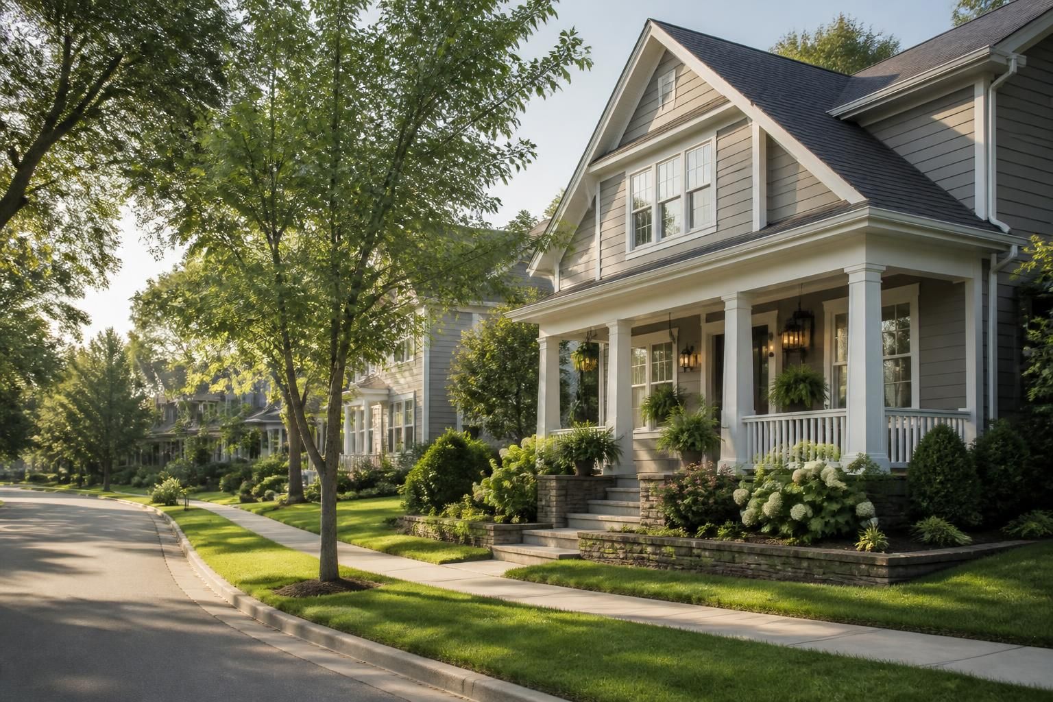 Attractive homes and mature landscaping along a clean street.